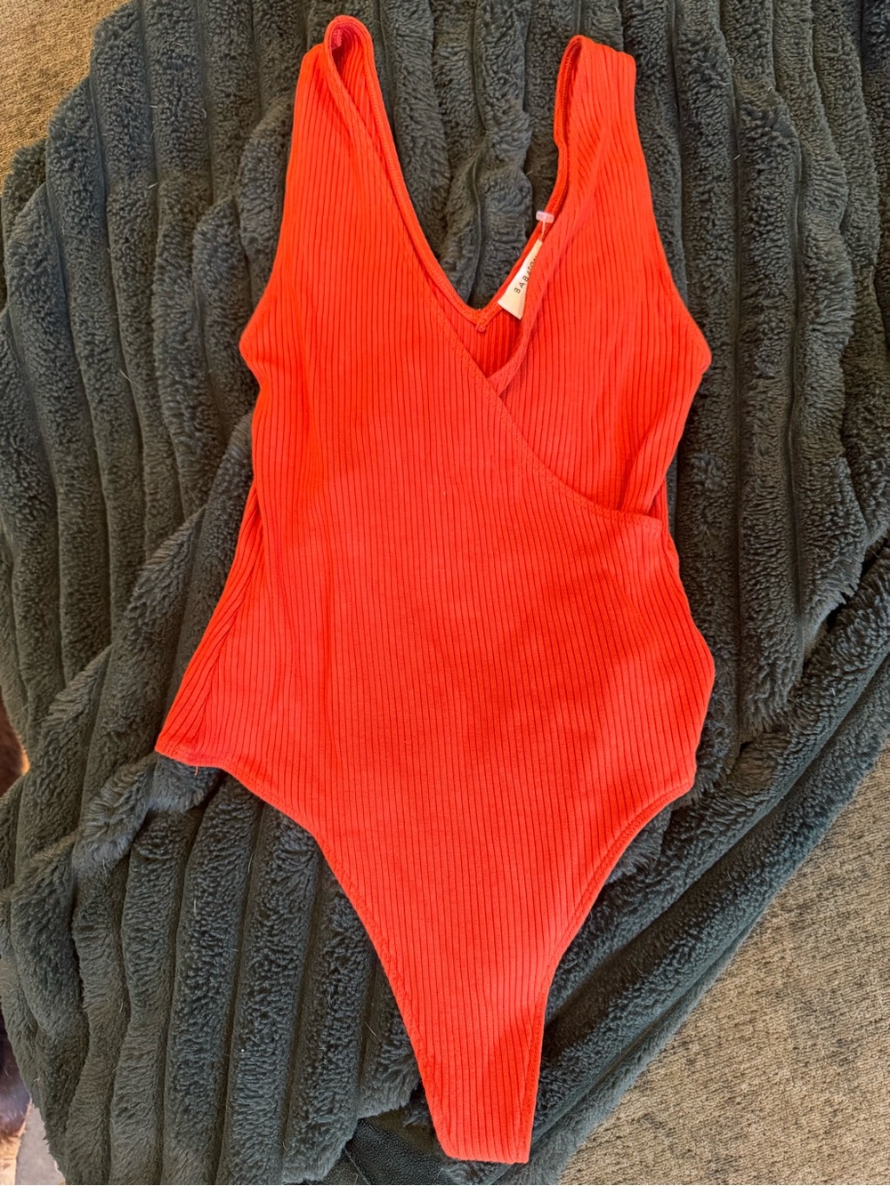 Babaton Ribbed Wrap-Front Bodysuit in Bright orange